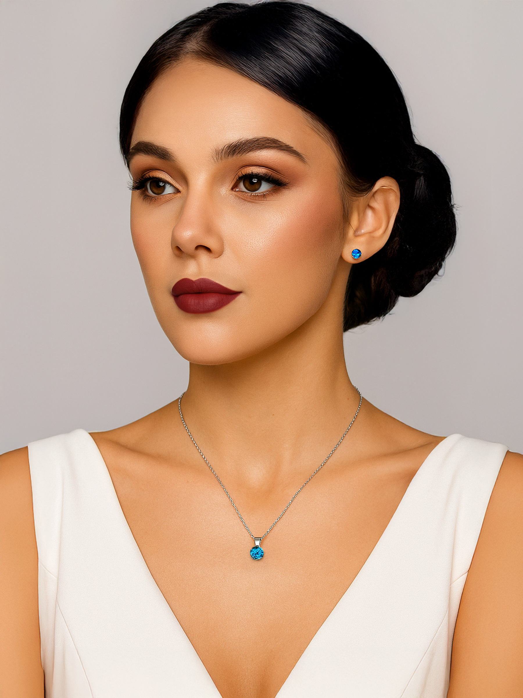 Woman wearing 1.25ct Lab Grown Aquamarine Blue Sapphire Pendant Necklace