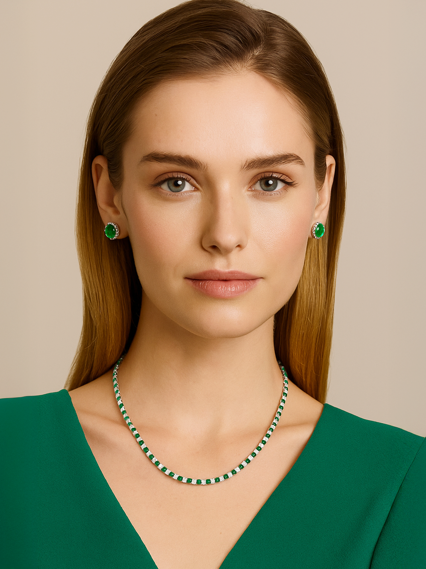 Woman wearing a green and white tennis necklace and earrings