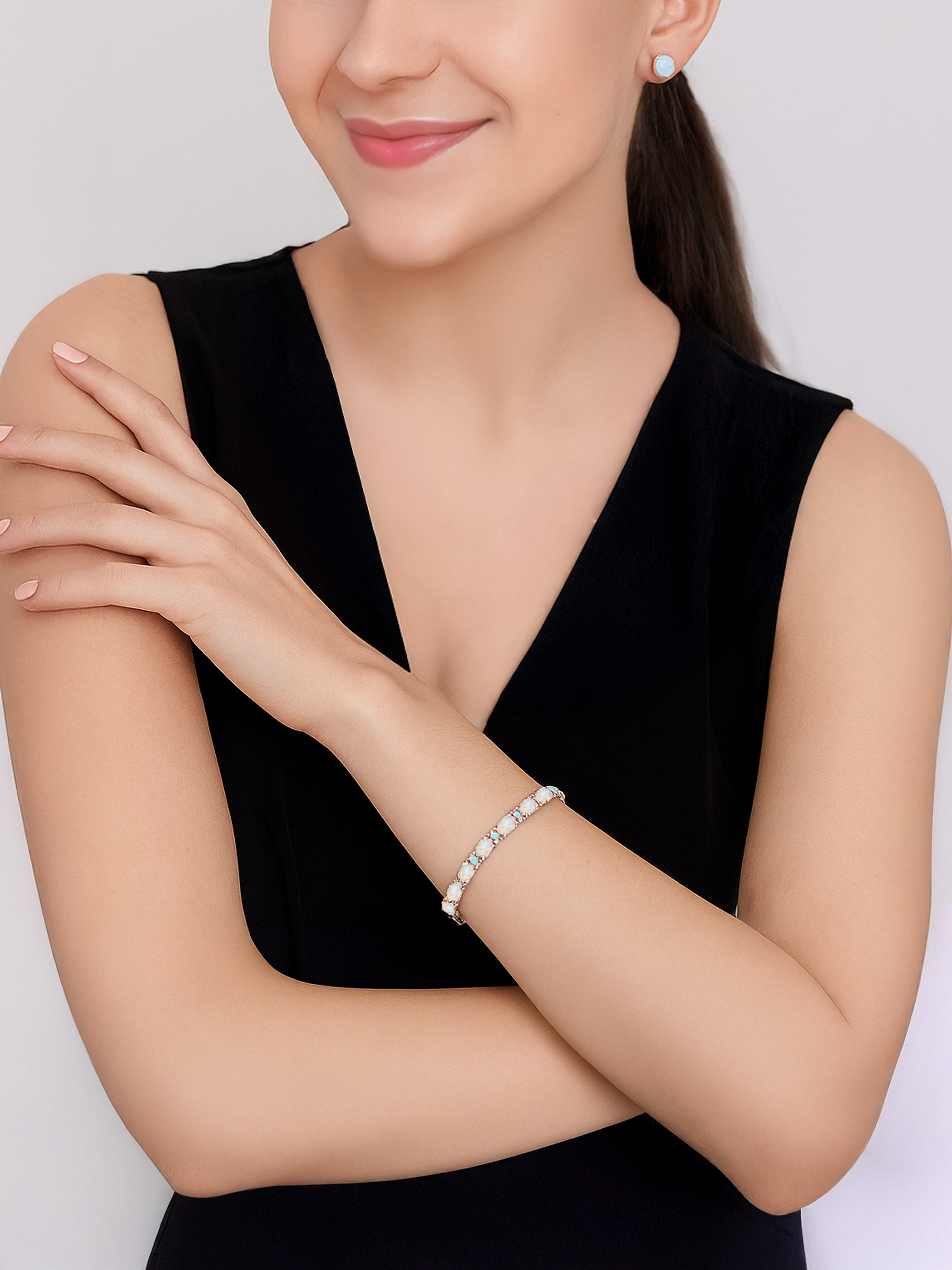 Woman wearing a White Opal Adjustable Bracelet
