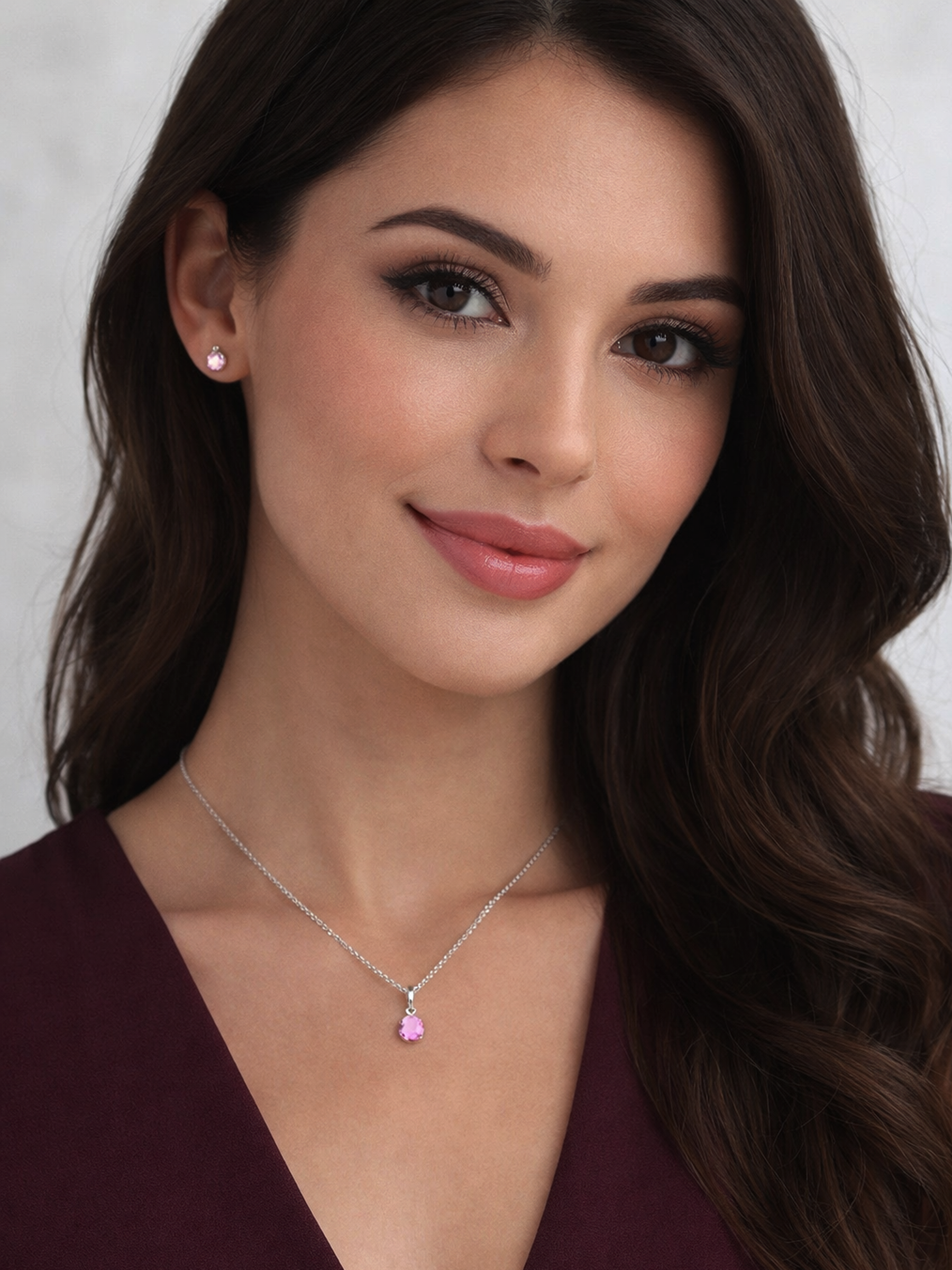 Woman wearing a 1.25Ct Lab Grown Light Pink Topaz Pendant Necklace