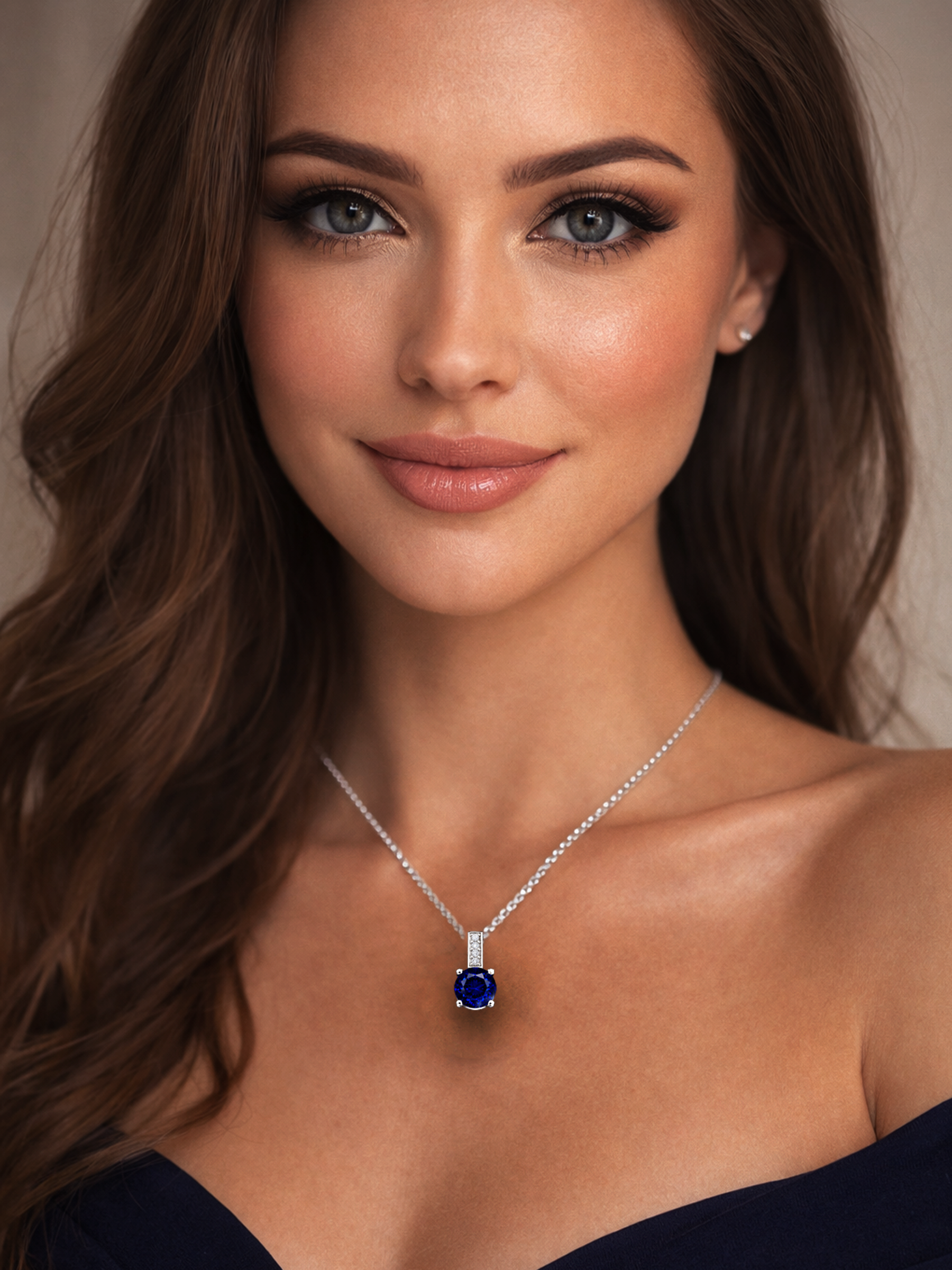 A close-up portrait of a woman wearing a 2Ct Lab Grown Blue Sapphire & Moissanite Round Cut Pendant Necklace