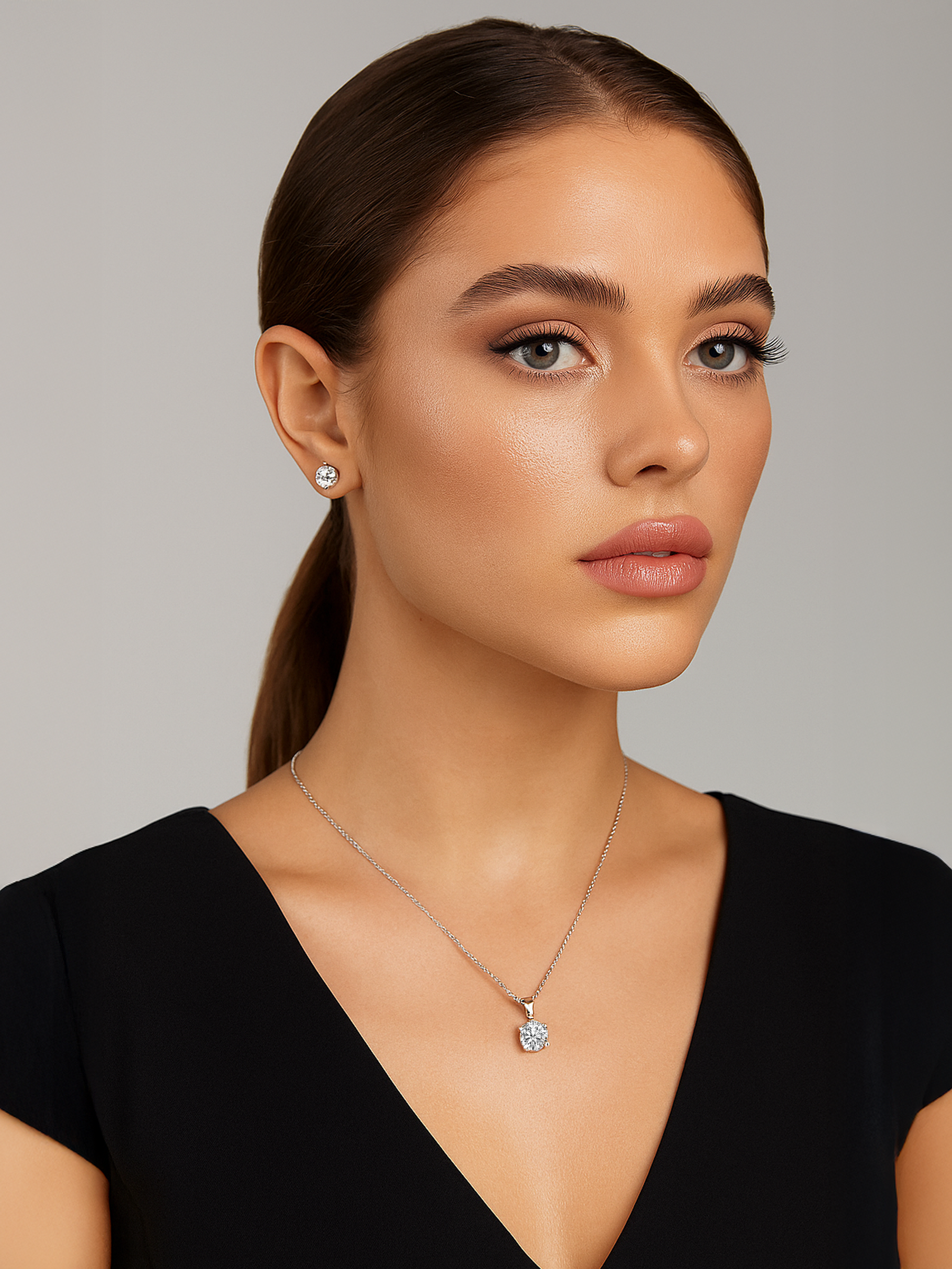 Woman wearing a 1Ct White Sapphire Round Cut Pendant Necklace